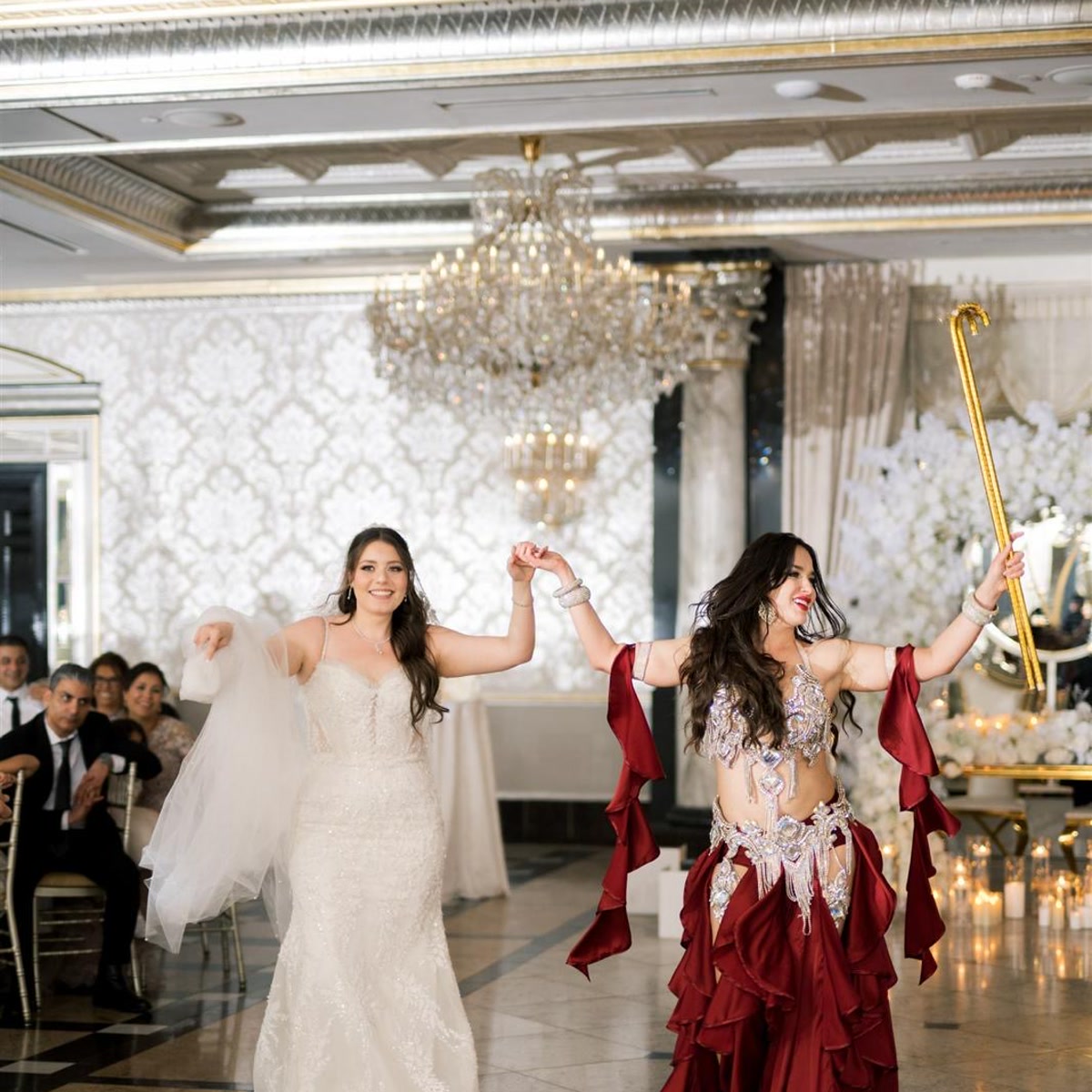 Ivanna dancing hand-in-hand with the bride during the reception